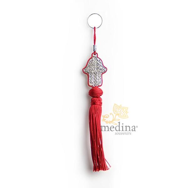 Porte cles main de fatima en métal argenté et pompon en soie Rouge