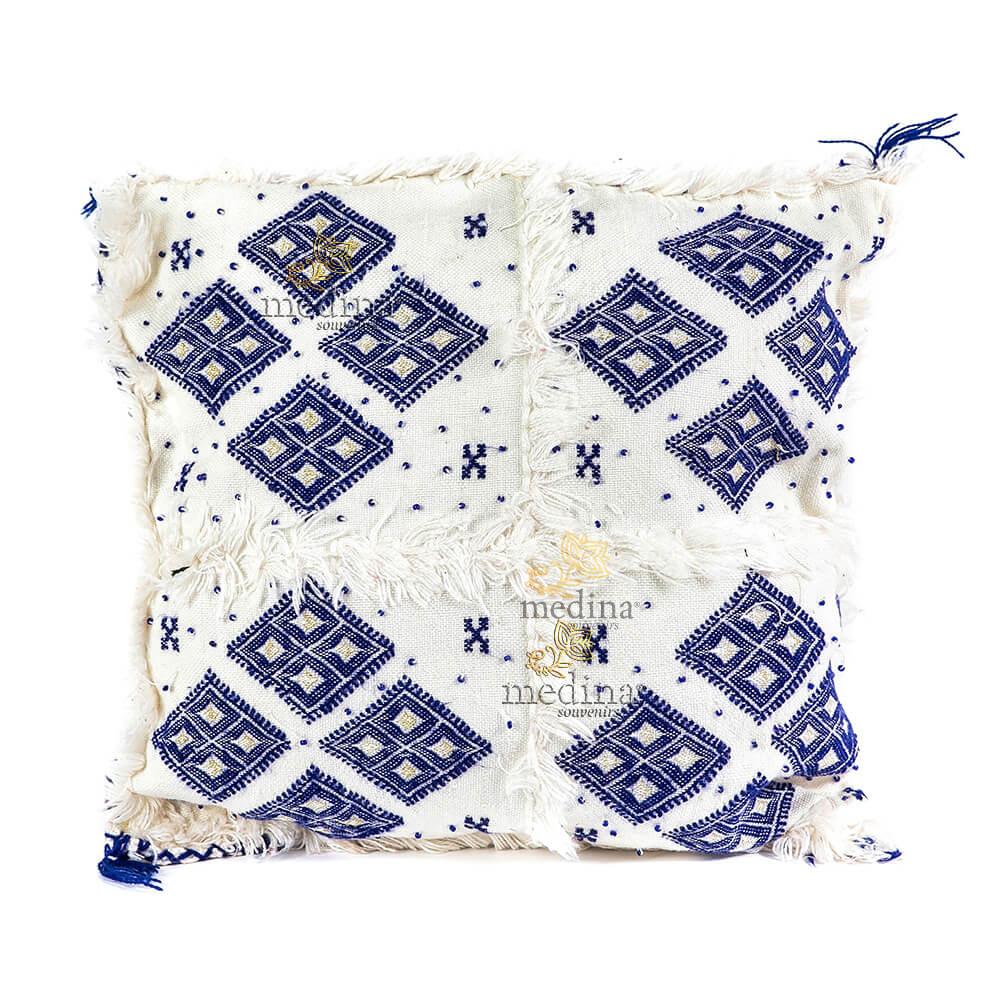 Coussin design berbere en laine vierge tissé main blanc et bleu