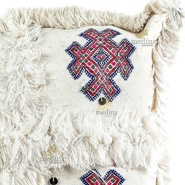 Coussin vintage berbere en laine vierge tissé main blanc motifs roses et rouges